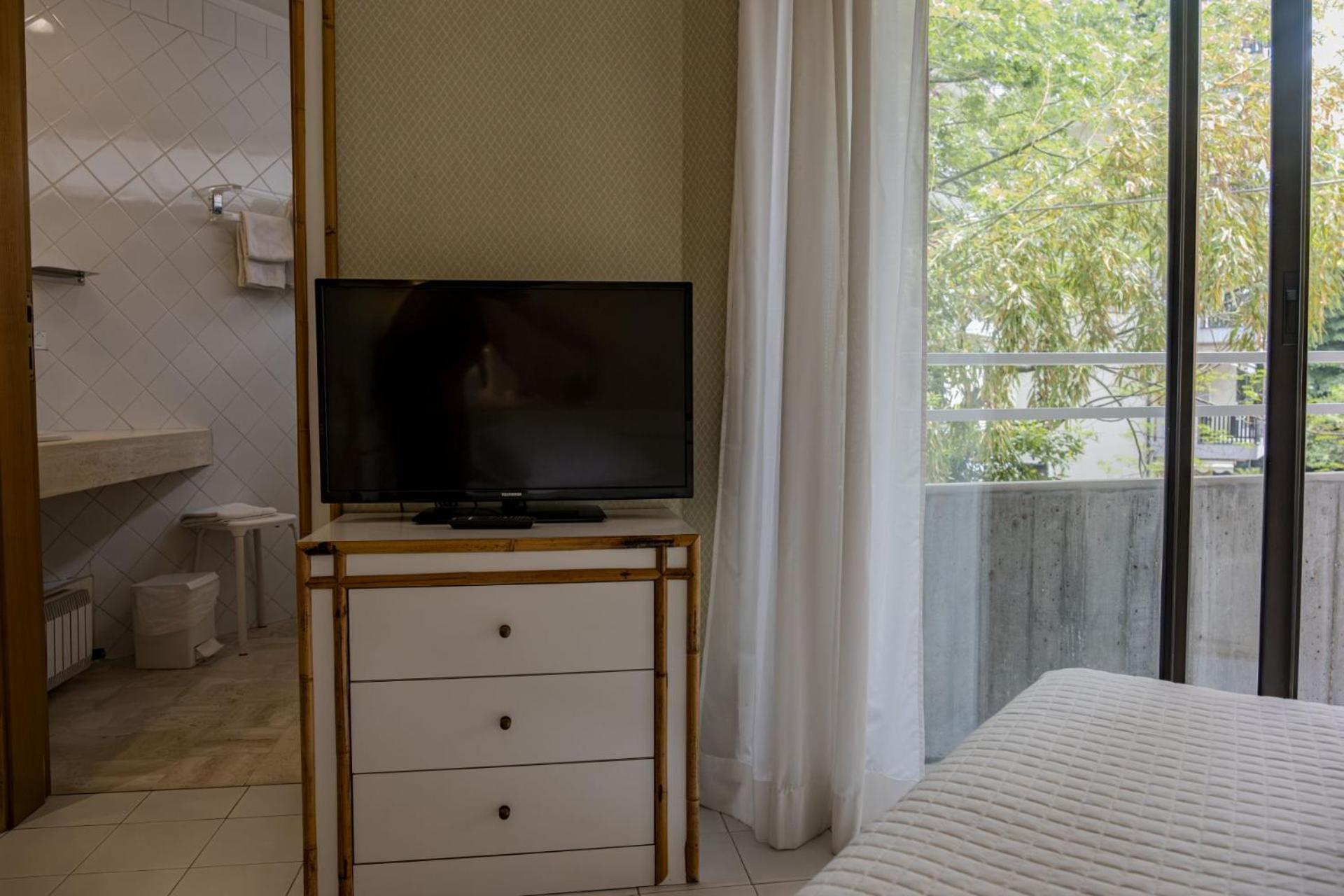 Hotel President - Vintage Hotel In Centro 리치오네 객실 사진